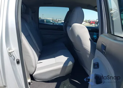 2012 Toyota Tacoma Base V6 z USA, uszkodzony, nr VIN 3TMLU4EN1CM087213